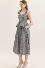 Linden peplum midi in black