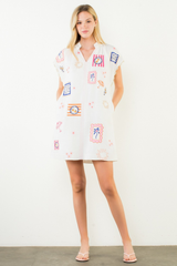 Gigi embroidered mini dress